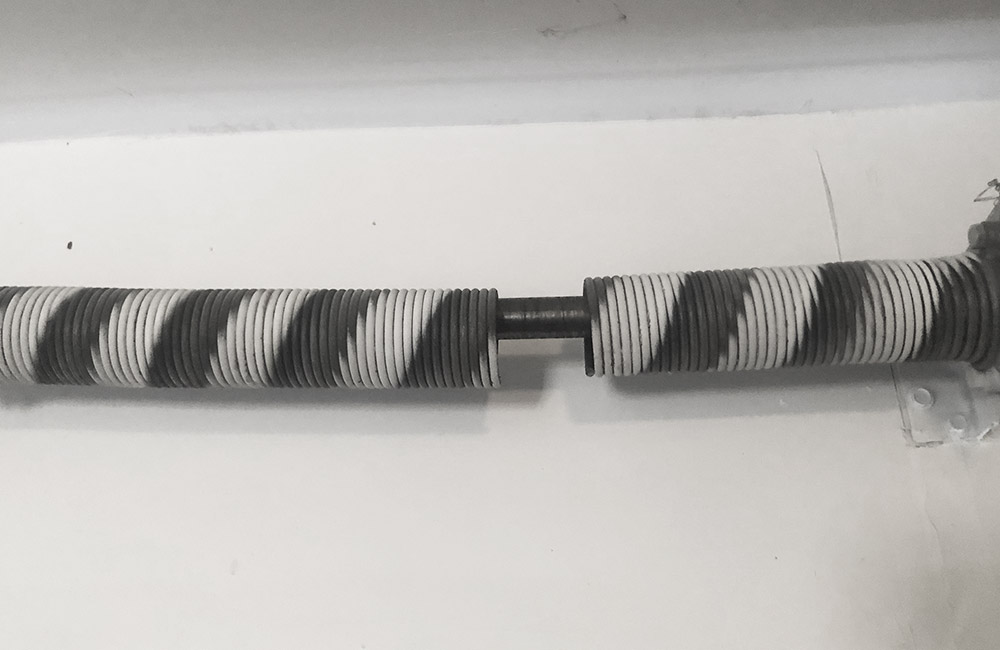 Broken garage door spring